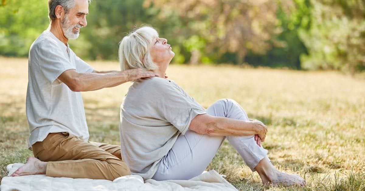 man give a massage to a woman
